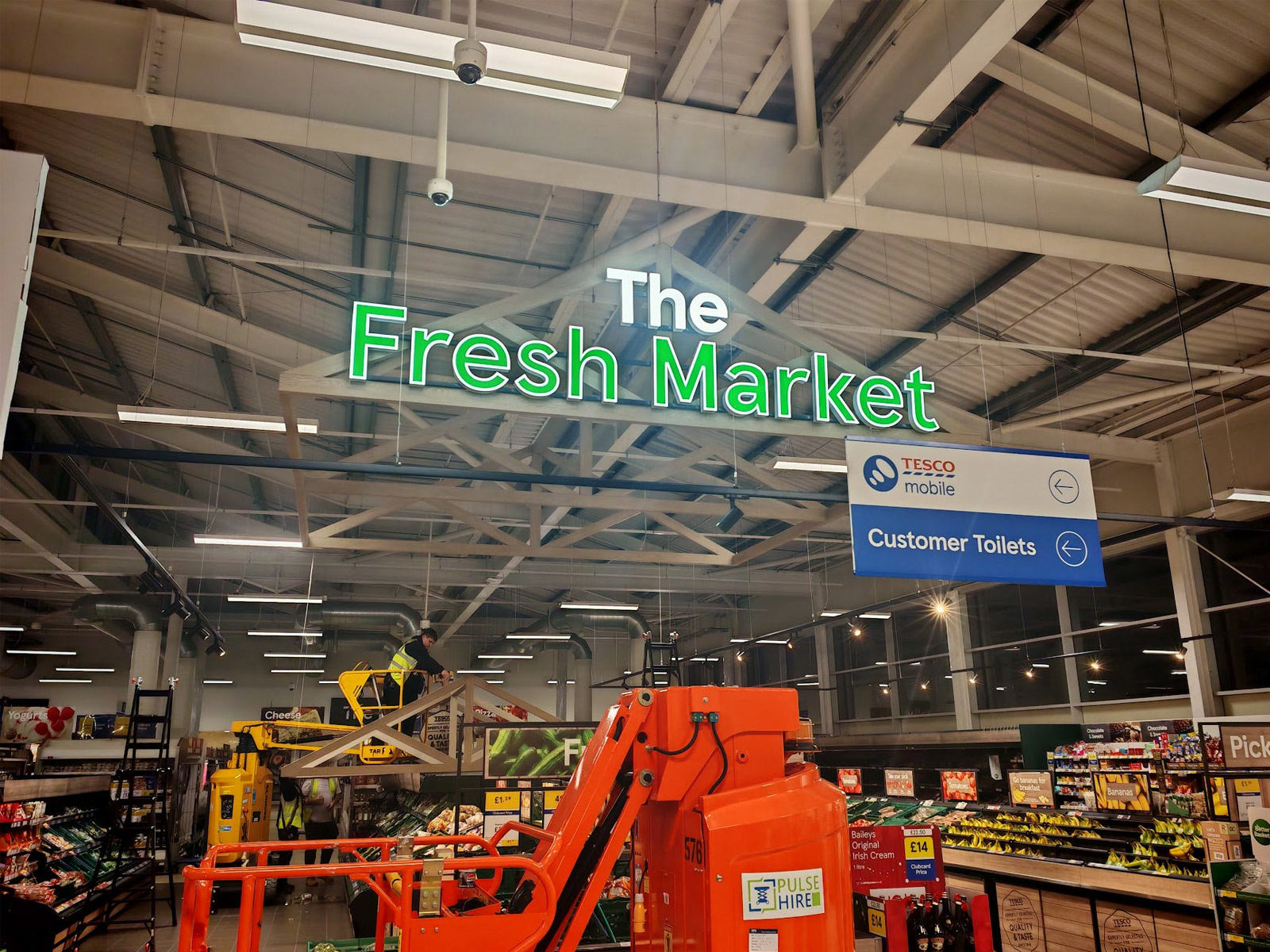 Tesco Fresh Market overhead signage installation